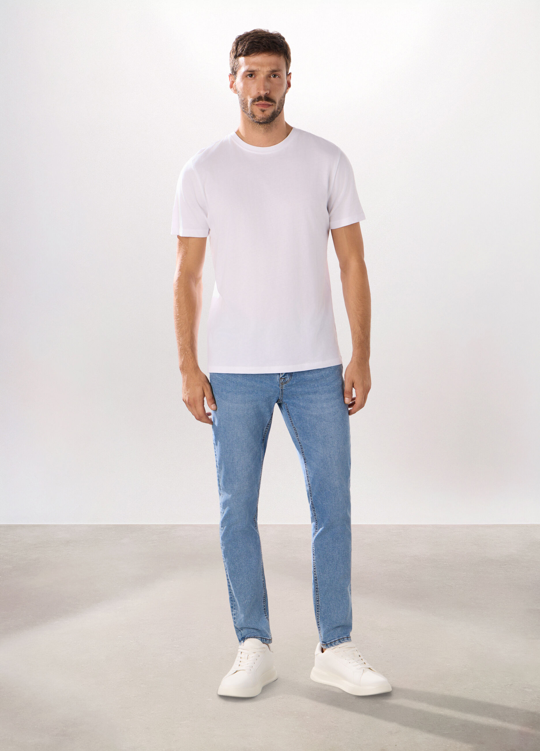 Jeans 5 tasche slim fit in cotone stretch_0