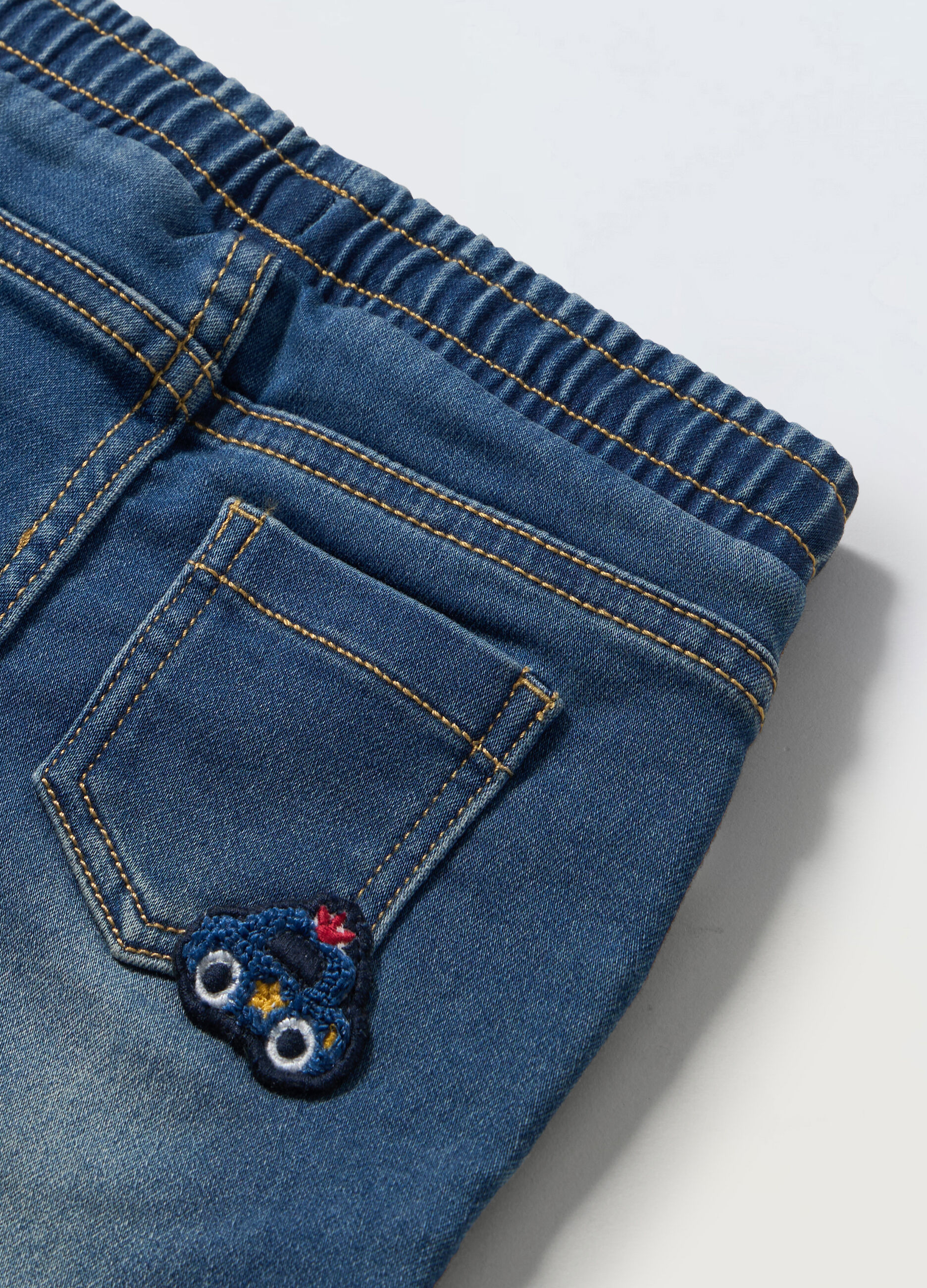 Jogger in french terry denim neonato_1