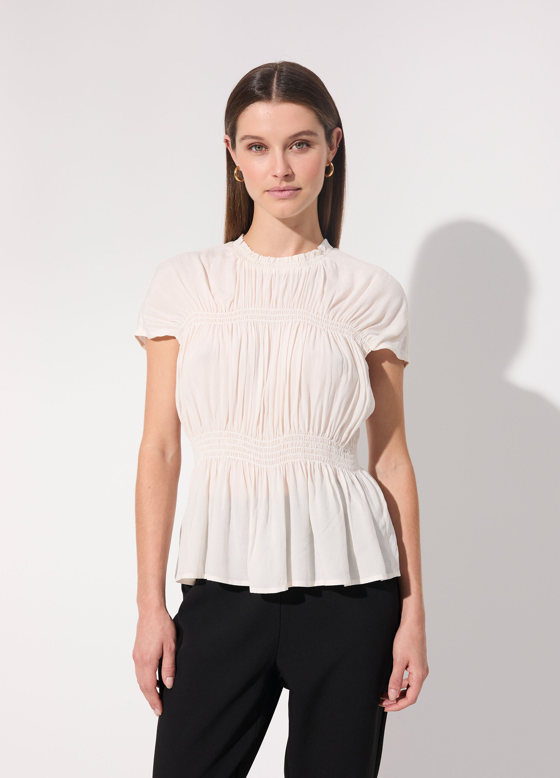 Blusa arricciata in punto smock donna_1