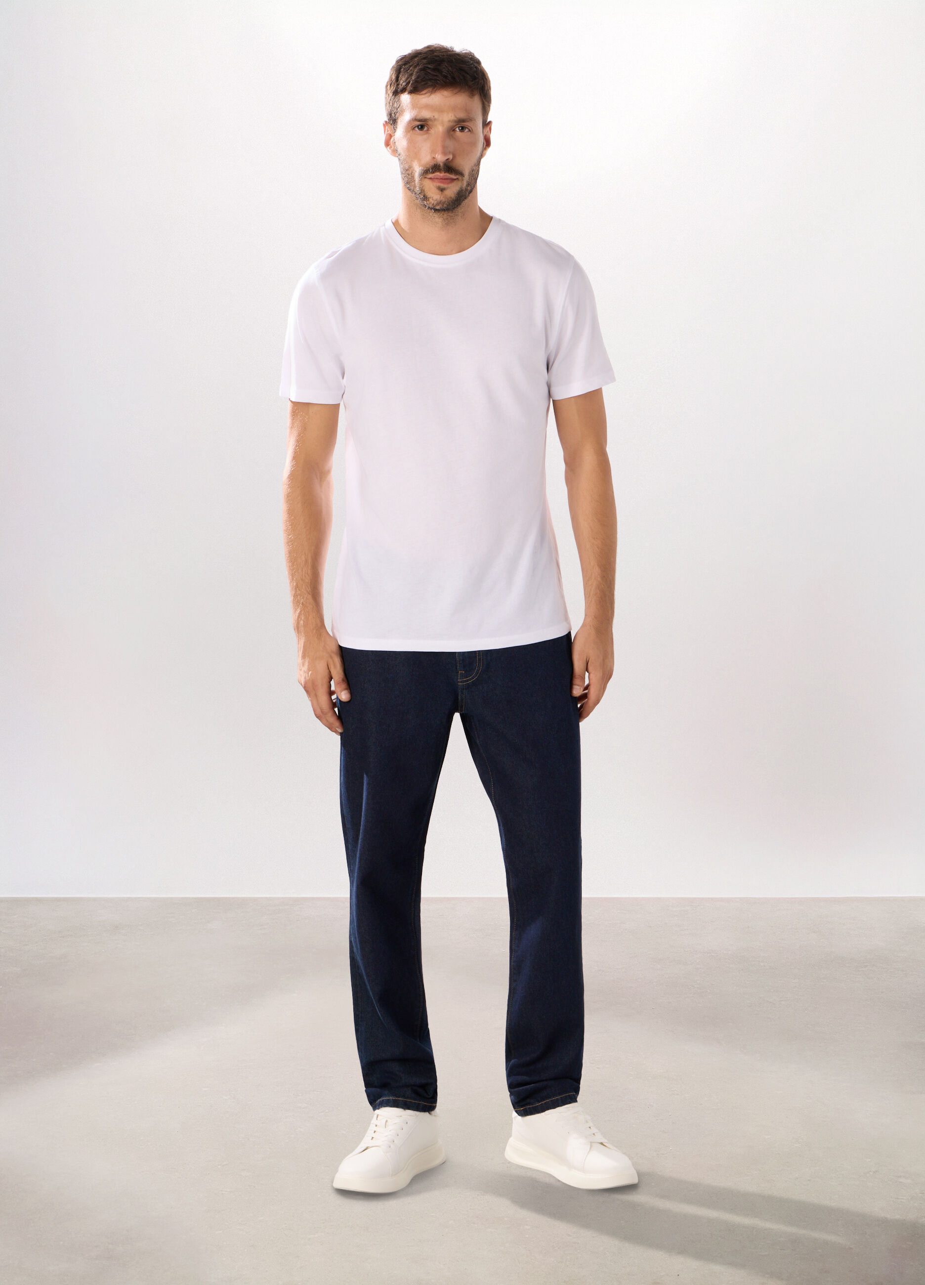 Jeans 5 tasche slim in denim di cotone uomo_0