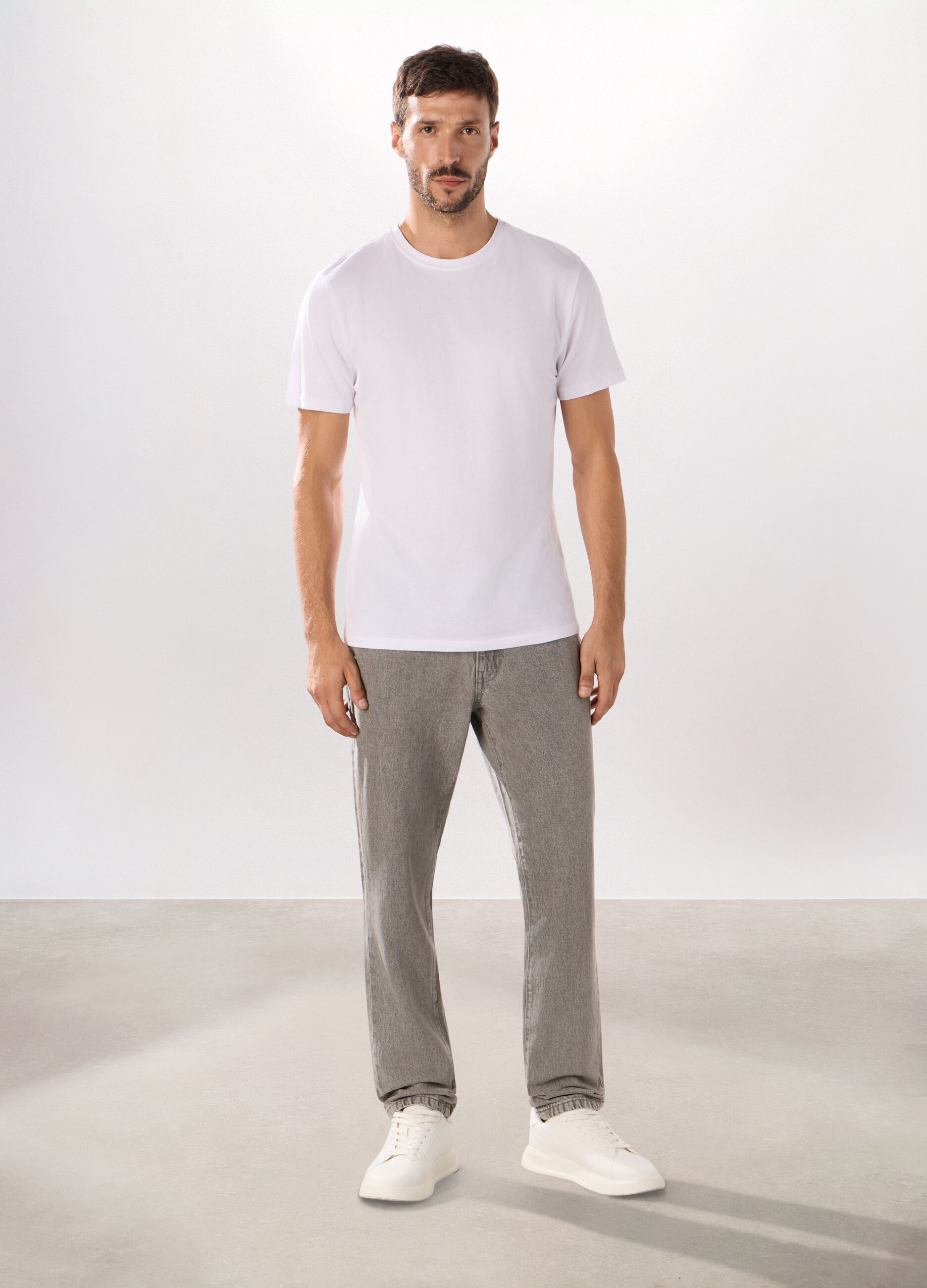 Jeans 5 tasche slim in denim di cotone uomo_0