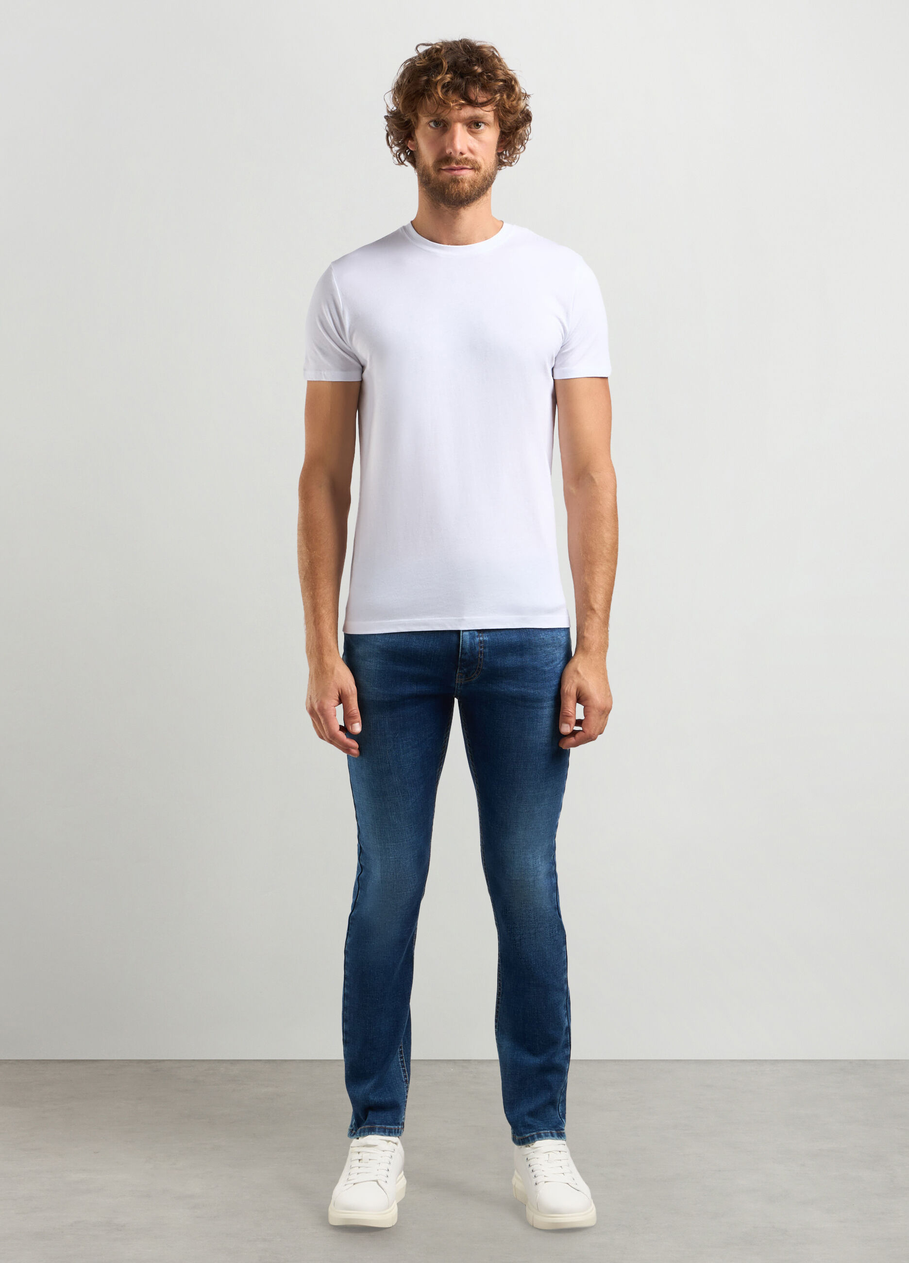 Jeans slim fit in cotone stretch uomo_0