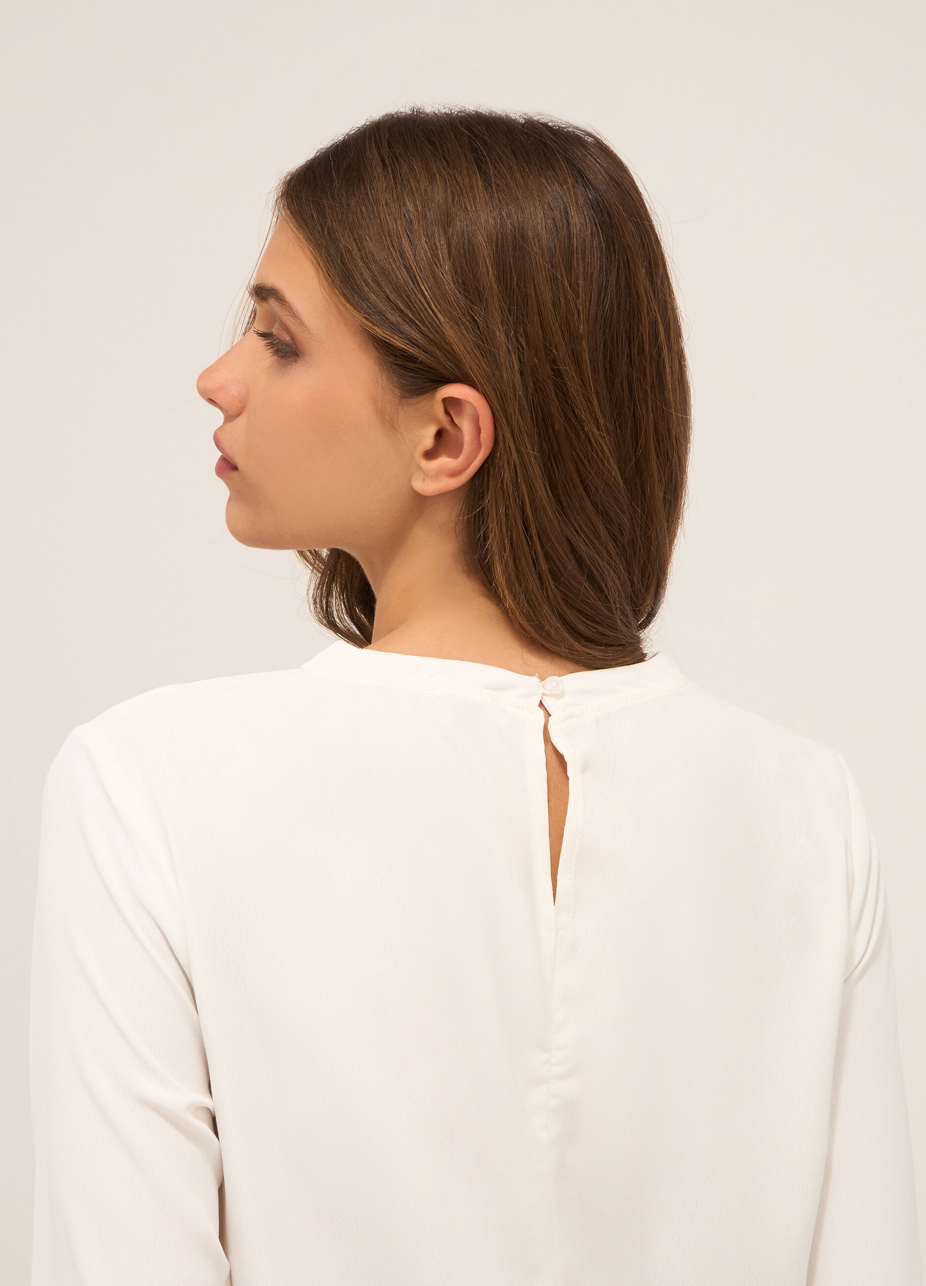 Blusa in tinta unita donna_2
