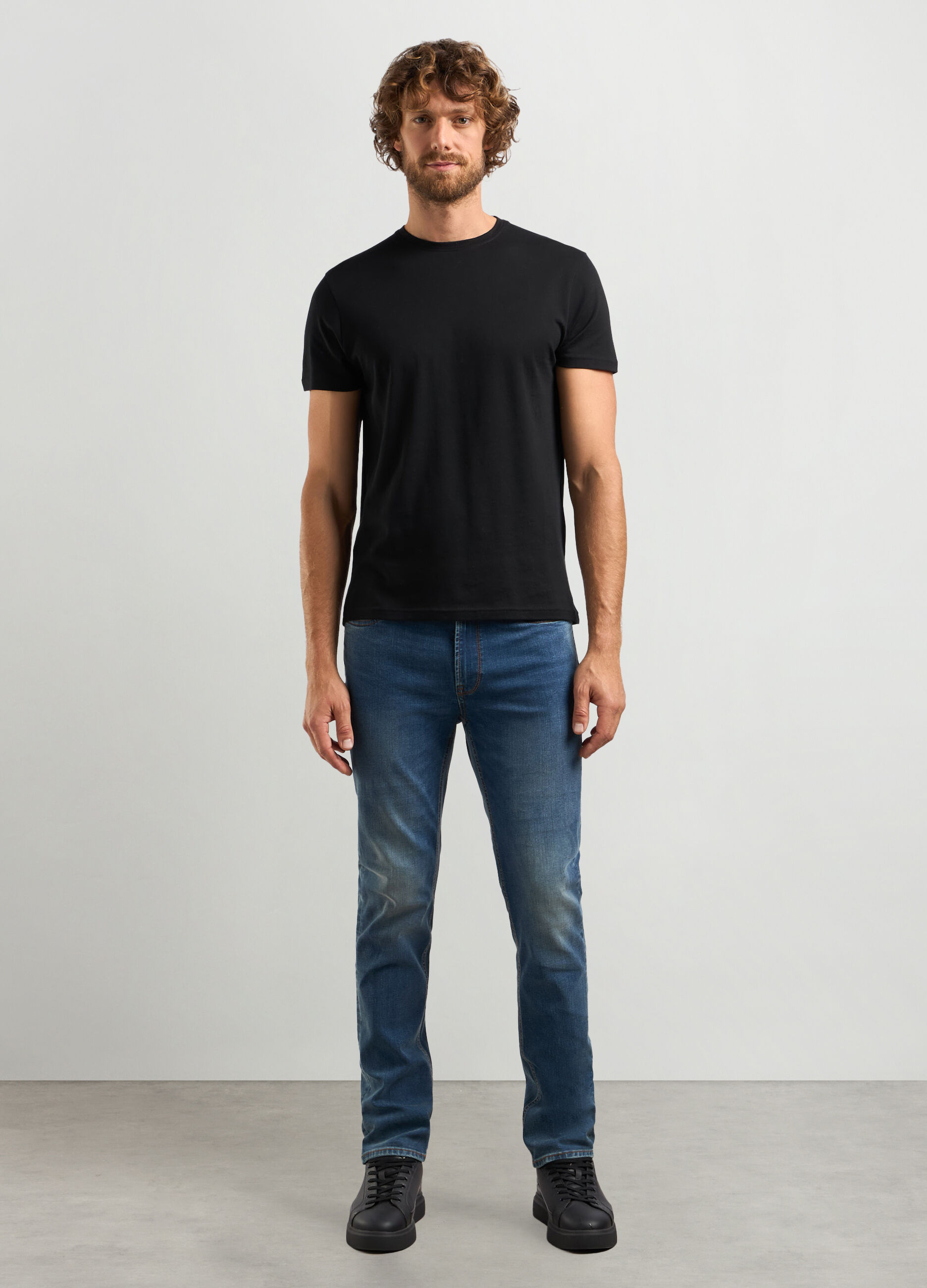Jeans slim fit in cotone stretch uomo_0