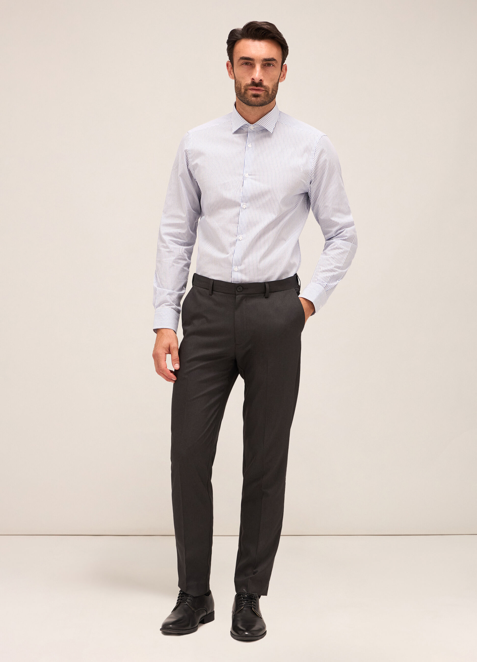 Pantaloni slim fit in tessuto tecnico uomo_0